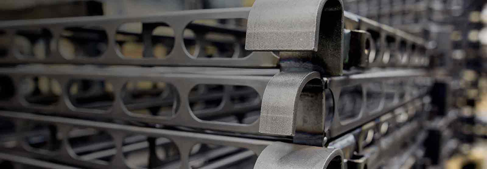 Close-up of stacked aluminum scaffolding components